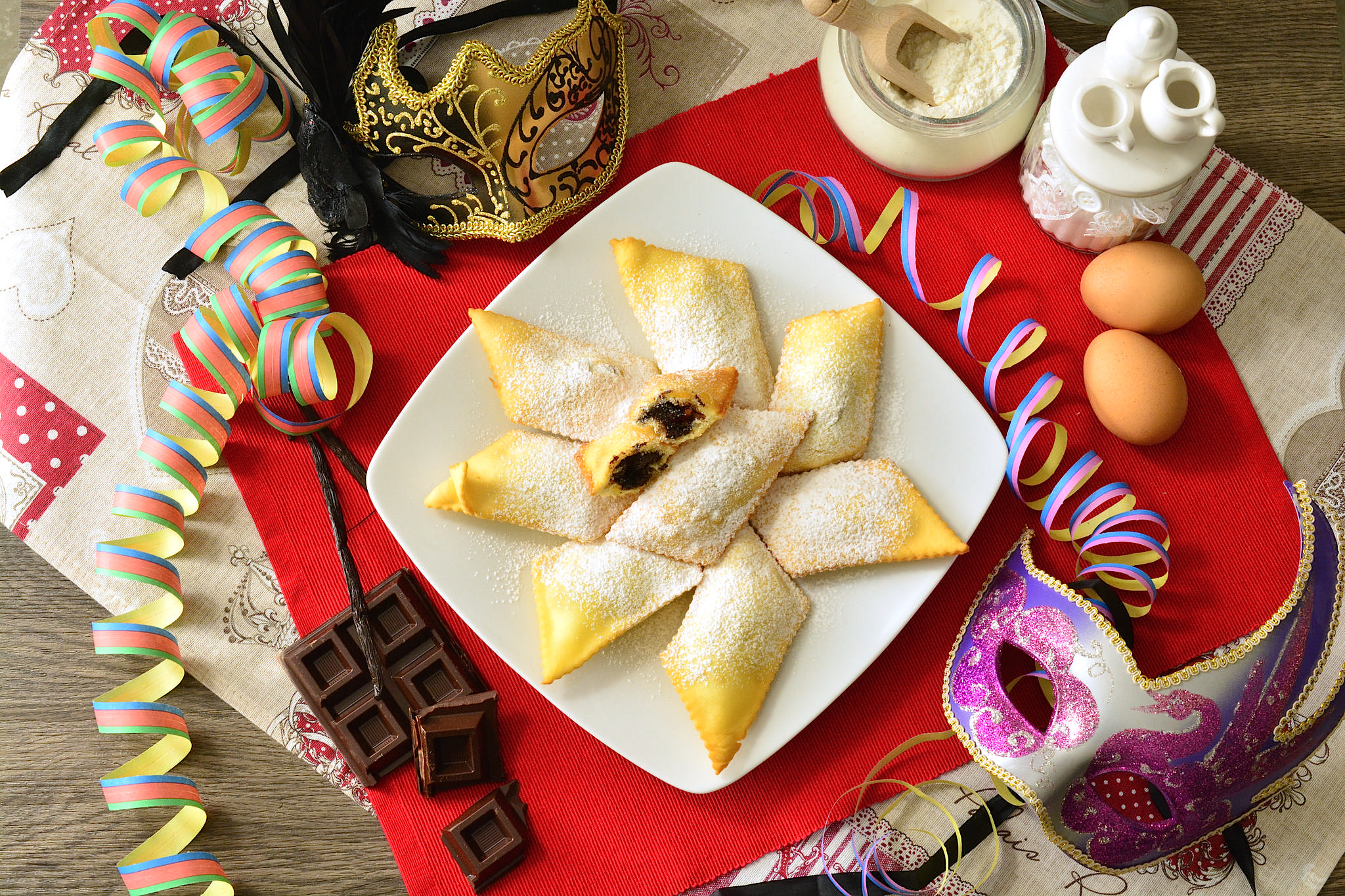 Bugie ripiene Bimby al cioccolato con zucchero a velo